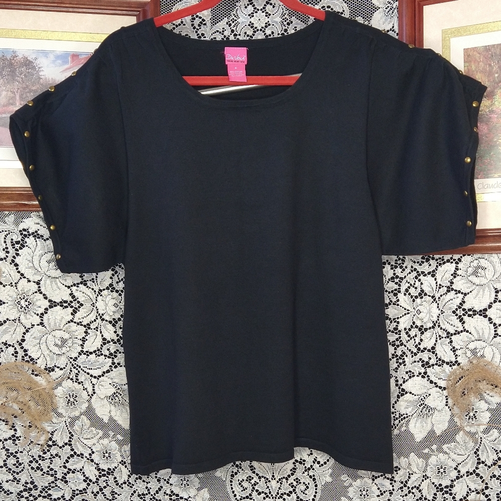 Du Jour black blouse with bronze colored studs along the shoulder and arm cuff